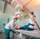 Radiologist and patient in a x-ray room. Classic ceiling-mounted x-ray system.